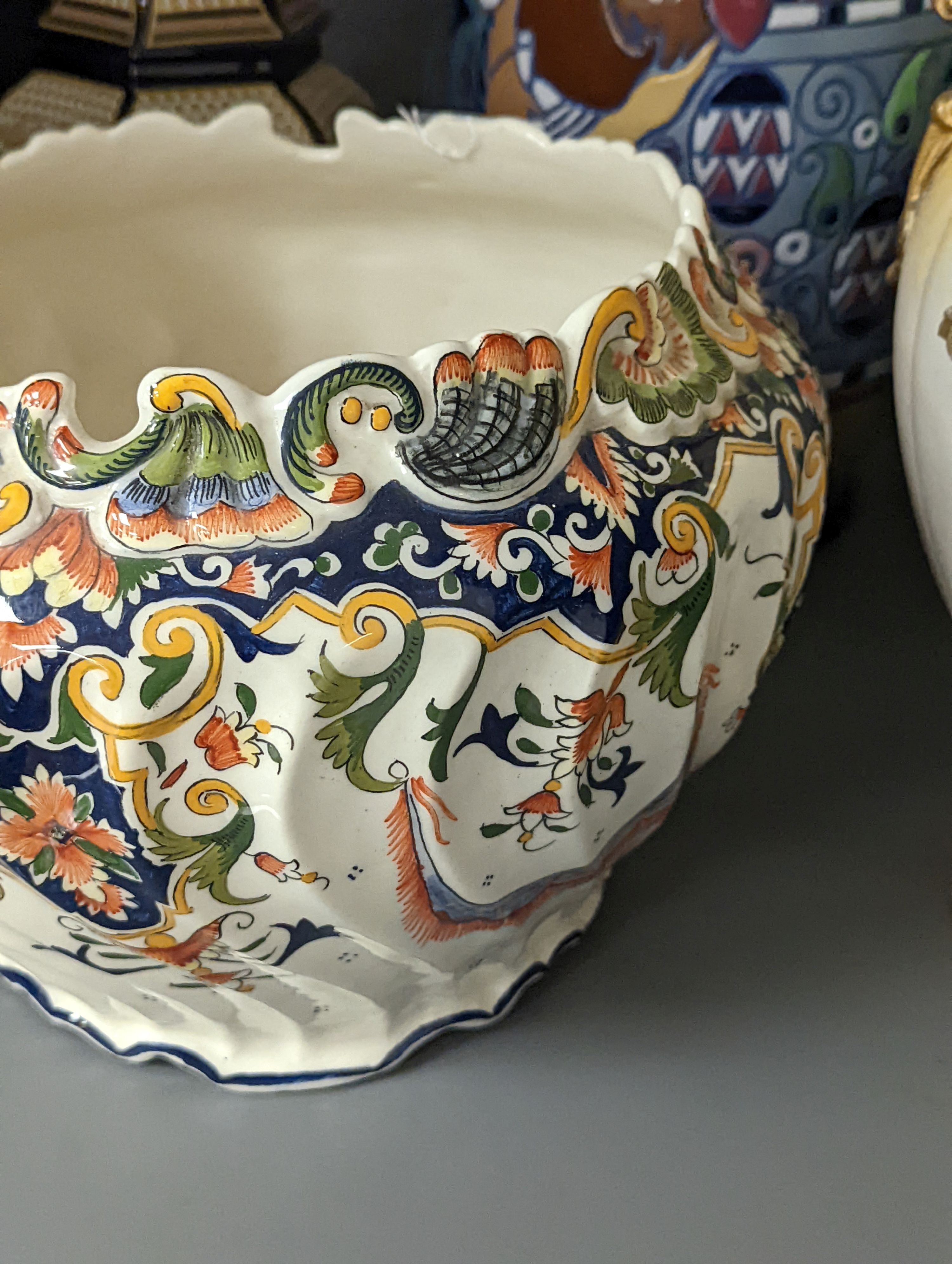 A Mont Saint Michael jardiniere, a lidded jar, two vases and an Amphora chicken decorated vase, Amphora vase 36 cms high.